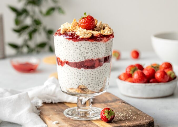 Strawberry Cheesecake Chia Pudding with coconut milk, cashews, vanilla, digestives, and strawberry compote