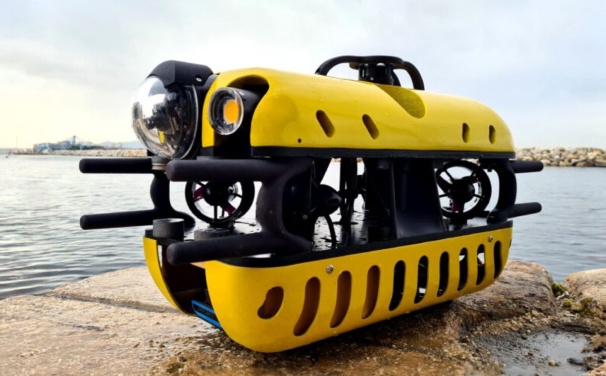 Photo shows the Mini TORTUGA, a surprisingly compact Remotely Operated Vehicle (ROV) that is part of the SeaClear 2.0 fleet, a team of autonomous and remote-operated robots that is cleaning up litter from the ocean floor