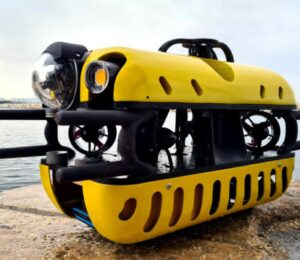 Photo shows the Mini TORTUGA, a surprisingly compact Remotely Operated Vehicle (ROV) that is part of the SeaClear 2.0 fleet, a team of autonomous and remote-operated robots that is cleaning up litter from the ocean floor