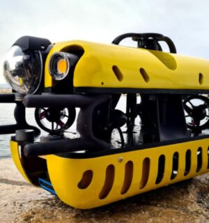 Photo shows the Mini TORTUGA, a surprisingly compact Remotely Operated Vehicle (ROV) that is part of the SeaClear 2.0 fleet, a team of autonomous and remote-operated robots that is cleaning up litter from the ocean floor