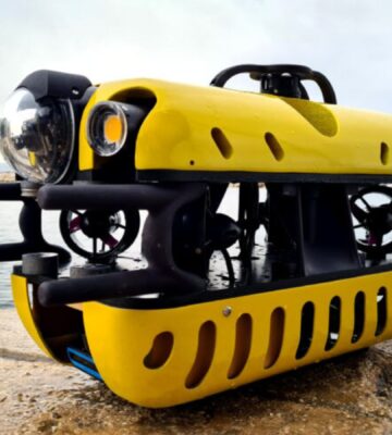 Photo shows the Mini TORTUGA, a surprisingly compact Remotely Operated Vehicle (ROV) that is part of the SeaClear 2.0 fleet, a team of autonomous and remote-operated robots that is cleaning up litter from the ocean floor