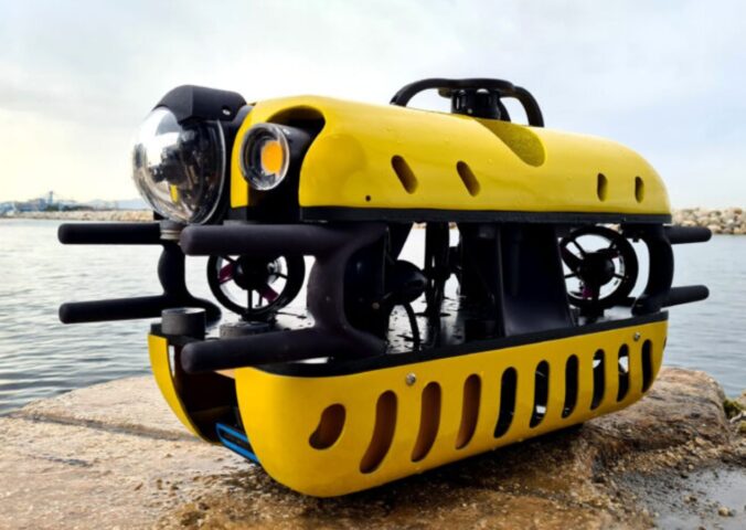 Photo shows the Mini TORTUGA, a surprisingly compact Remotely Operated Vehicle (ROV) that is part of the SeaClear 2.0 fleet, a team of autonomous and remote-operated robots that is cleaning up litter from the ocean floor