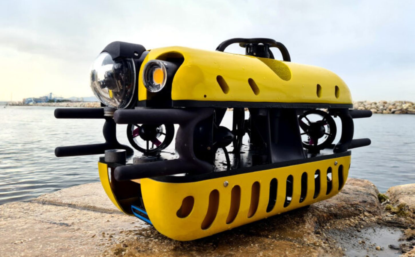 Photo shows the Mini TORTUGA, a surprisingly compact Remotely Operated Vehicle (ROV) that is part of the SeaClear 2.0 fleet, a team of autonomous and remote-operated robots that is cleaning up litter from the ocean floor