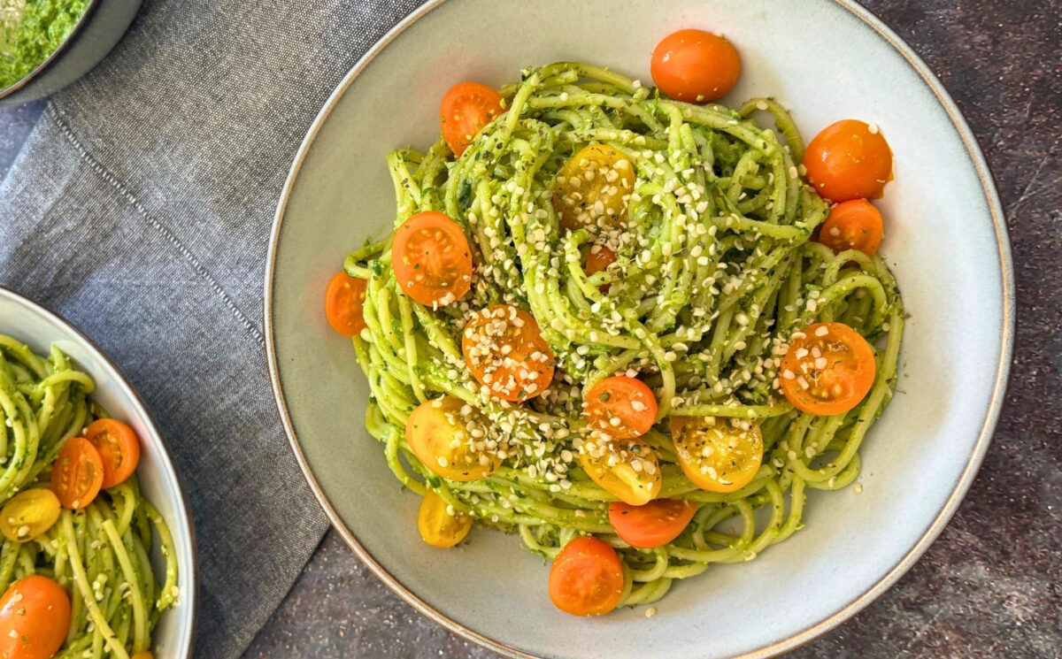 wild garlic and edamame pesto pasta with cherry tomatoes and hemp hearts