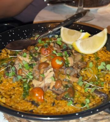 This mushroom paella at Mercado de San Miguel in Madrid is one of the stops on Reyes' vegan food tour of Spain