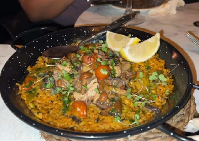 This mushroom paella at Mercado de San Miguel in Madrid is one of the stops on Reyes' vegan food tour of Spain