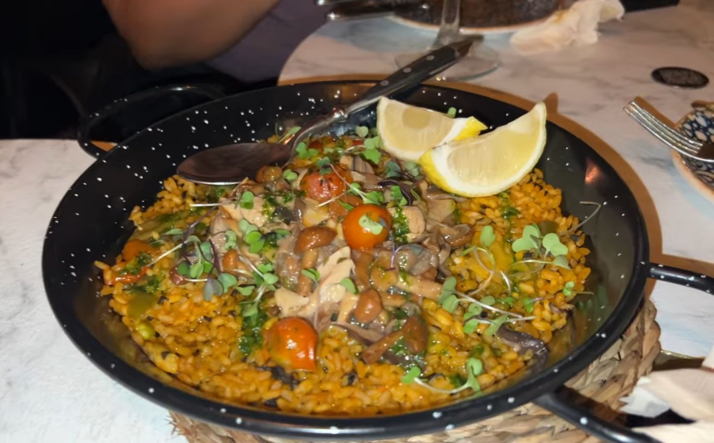 This mushroom paella at Mercado de San Miguel in Madrid is one of the stops on Reyes' vegan food tour of Spain