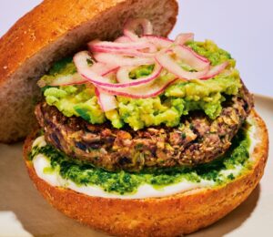 Cumin Lime Black Bean Burgers with cilantro, onion, black beans, lime, and vegan mayo