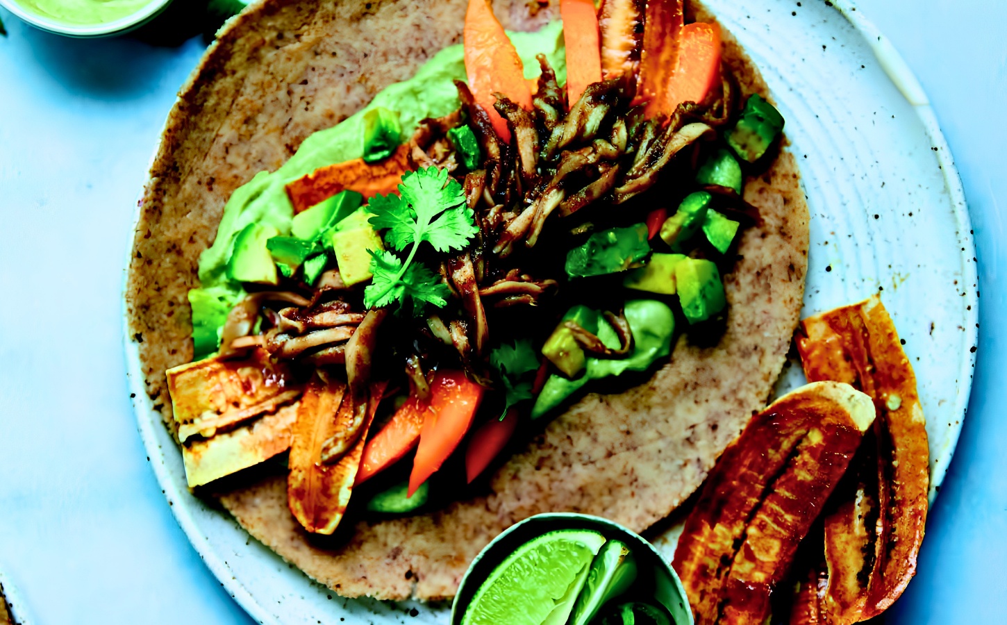 Island-Style Jerk Pulled Mushroom Wraps with plantain, jalapeno, and almond flatbreads