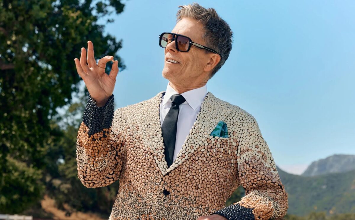 Photo shows Kevin Bacon holding up a single bean. Kevin Bacon has suggested swapping meat for beans on a Wednesday to improve your health, harm fewer animals, and protect the planet