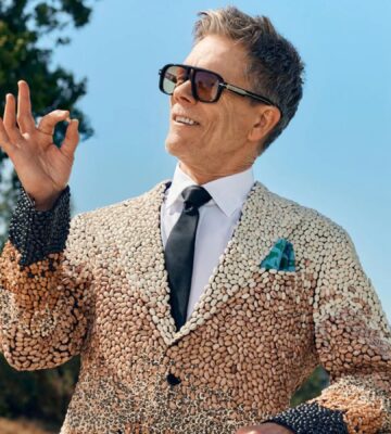 Photo shows Kevin Bacon holding up a single bean. Kevin Bacon has suggested swapping meat for beans on a Wednesday to improve your health, harm fewer animals, and protect the planet