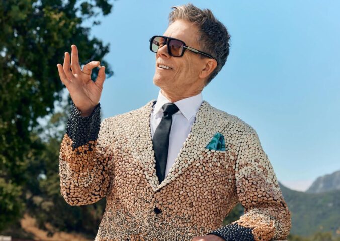 Photo shows Kevin Bacon holding up a single bean. Kevin Bacon has suggested swapping meat for beans on a Wednesday to improve your health, harm fewer animals, and protect the planet