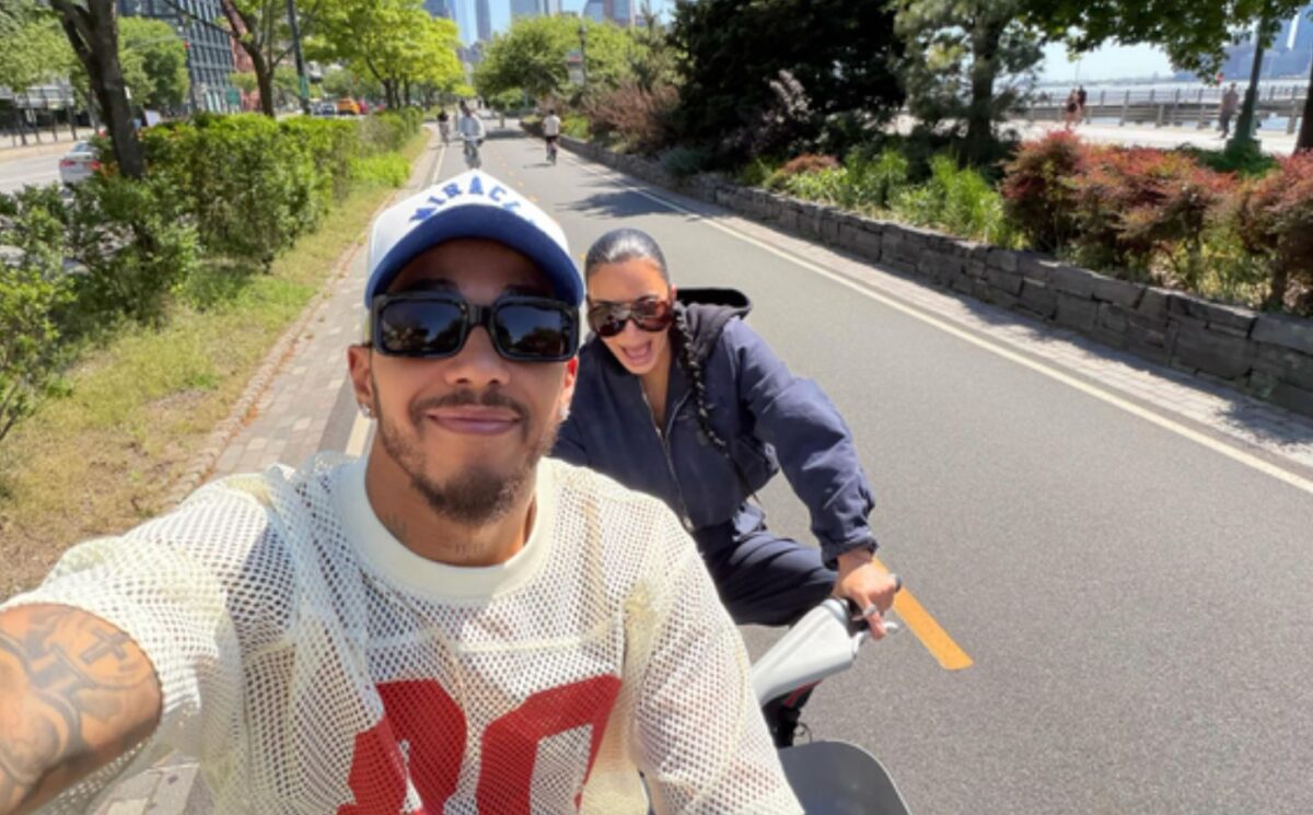 Photo shows Lewis Hamilton and Kim Kardashian cycling together on rental bikes