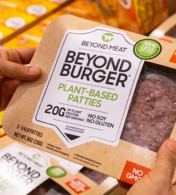 Photo shows someone's hands holding a pack of plant-based meat by Beyond Meat. The European Parliament has voted to ban a long list of “meaty” words from use on plant-based products and other alternatives