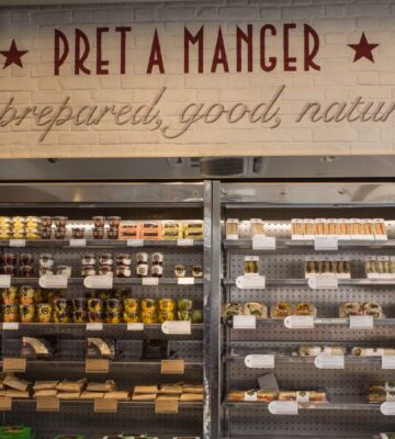 Photo shows the refrigerator inside a Pret cafe, including a sign that says, "freshly prepared, good, natural, food." Pret A Manger is facing a £1 million “Public Accountability Campaign” over its broken promise to stop selling “Frankenchickens” by 2026