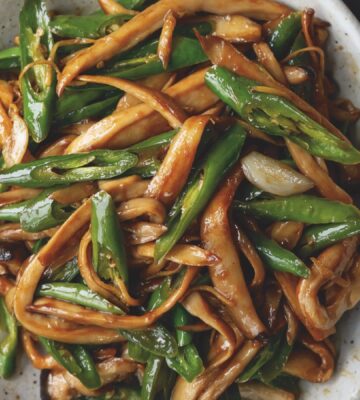 Sichuan Chili Mushroom Shreds (La Jiao Xiang Gu Si) with Shaoxing cooking wine, soy sauce, and cooked rice