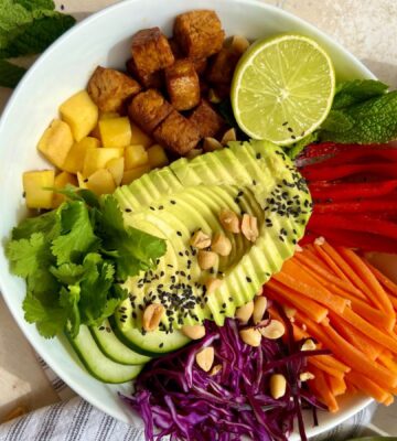 Summer Roll Bowl with tempeh, rice noodles, peppers, cabbage, and carrot