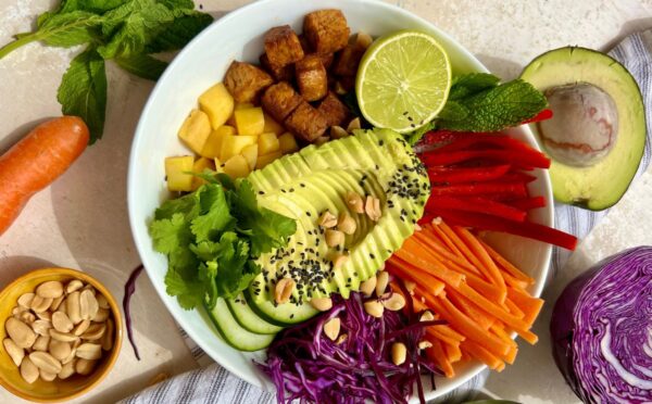 Summer Roll Bowl with tempeh, rice noodles, peppers, cabbage, and carrot