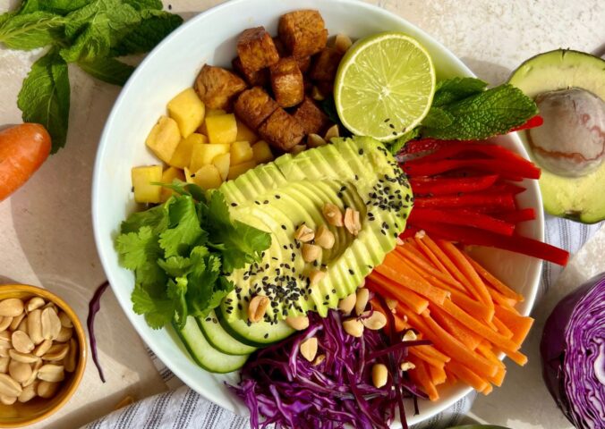 Summer Roll Bowl with tempeh, rice noodles, peppers, cabbage, and carrot
