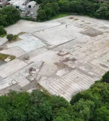 Aerial view of the demolished Ashton-under-Lyne slaughterhouse site, showing the flattened area where the UK pig gas chamber demolished after the facility’s closure once operated