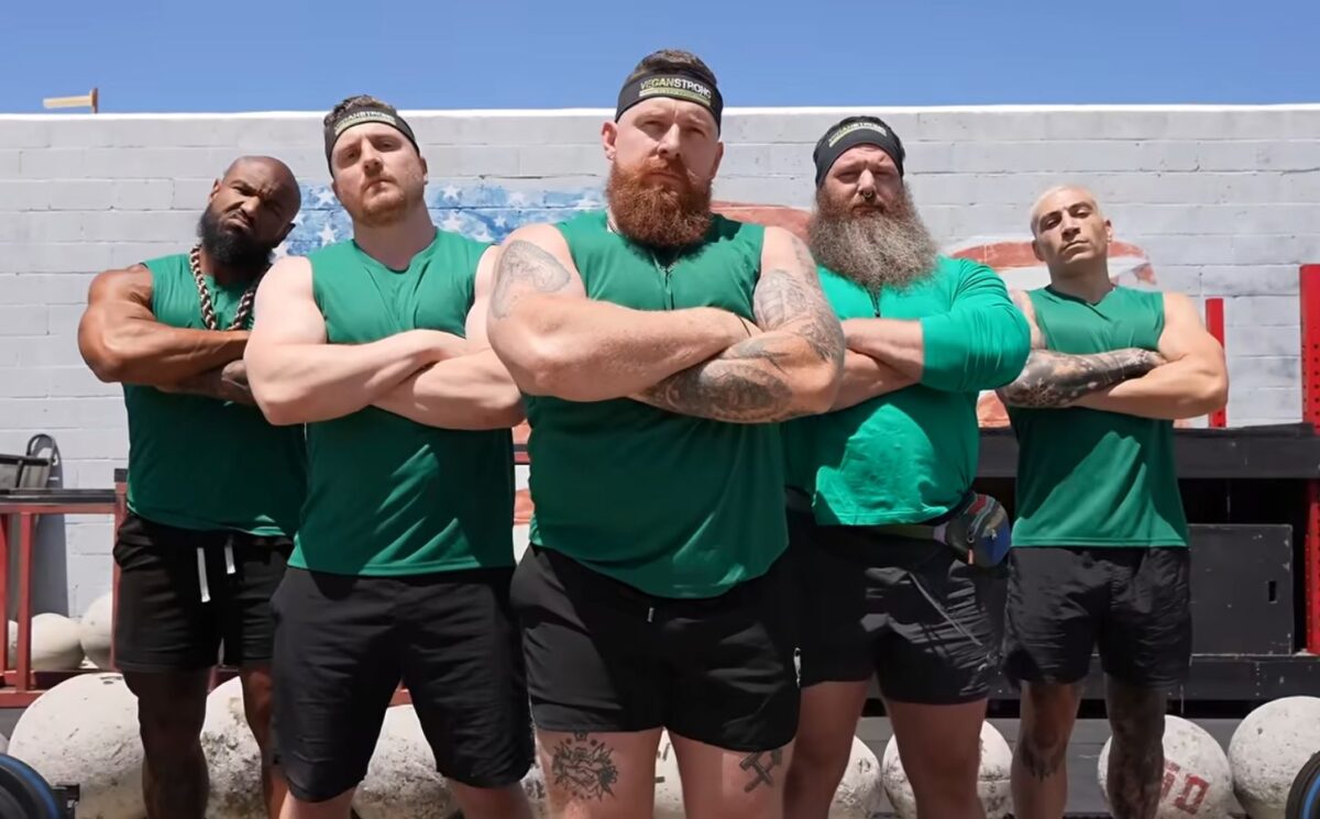 The vegan team stands with arms crossed before competing in a vegans vs meat eaters strength challenge organized by fitness YouTuber Brandon William