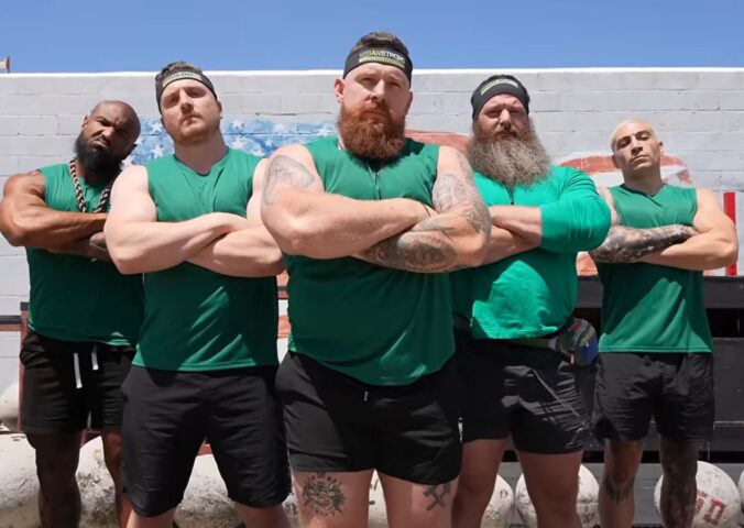The vegan team stands with arms crossed before competing in a vegans vs meat eaters strength challenge organized by fitness YouTuber Brandon William