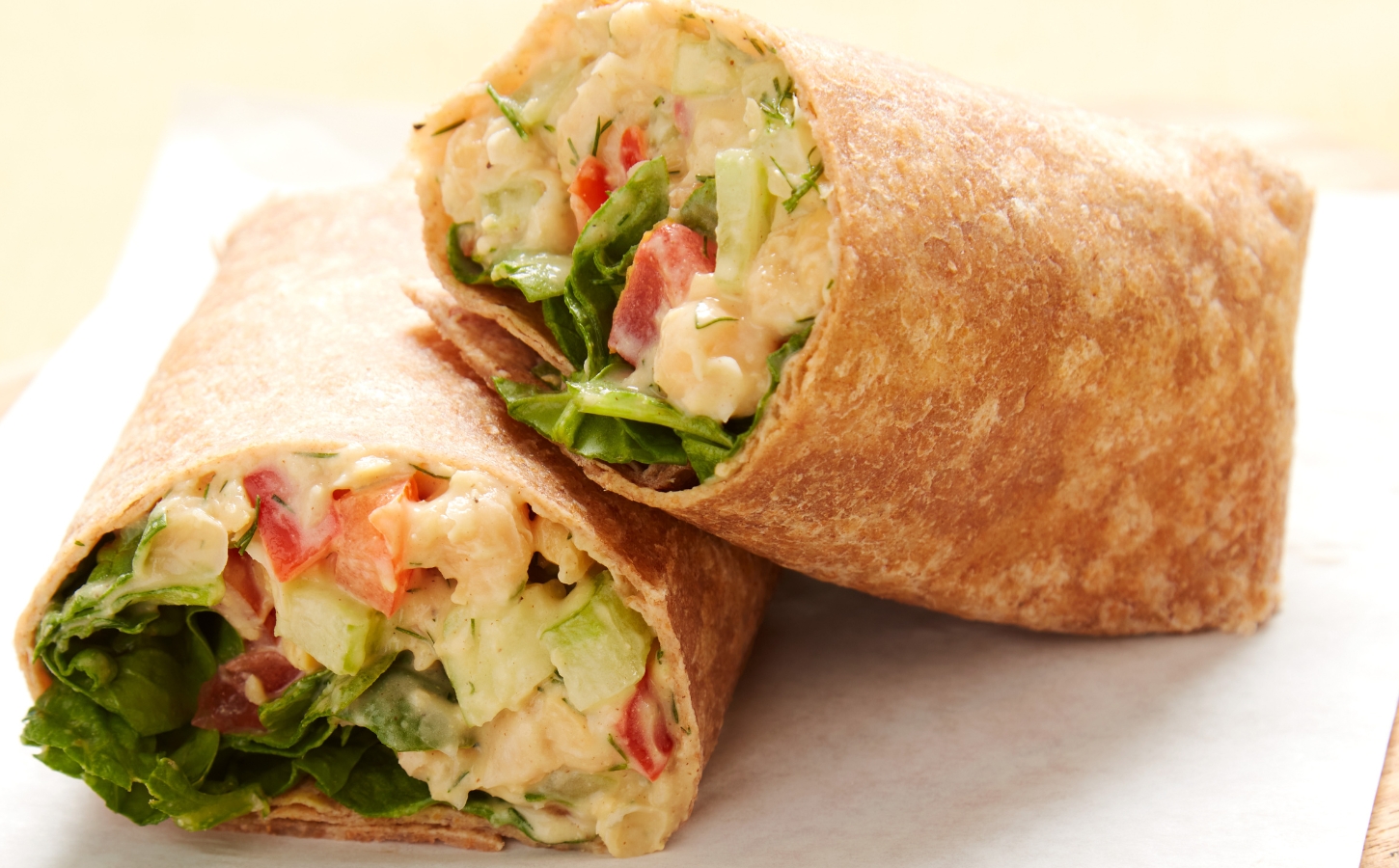 Apple-Dill Chickpea Mash Wrap with celery, bell pepper, red onion, mayo, and mustard