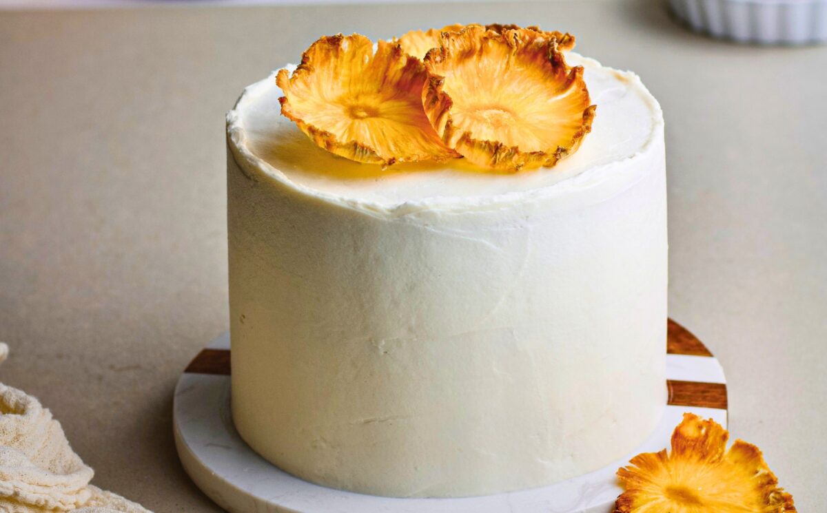 Coconut & Pineapple Layer Cake with pineapple slices, cinnamon, coconut milk, and vanilla
