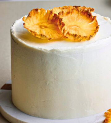 Coconut & Pineapple Layer Cake with pineapple slices, cinnamon, coconut milk, and vanilla