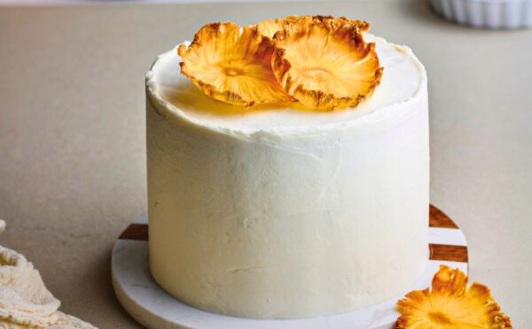 Coconut & Pineapple Layer Cake with pineapple slices, cinnamon, coconut milk, and vanilla