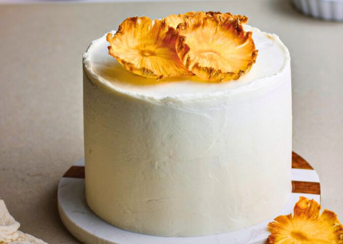 Coconut & Pineapple Layer Cake with pineapple slices, cinnamon, coconut milk, and vanilla