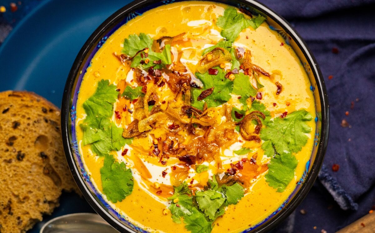 Lentil Curry Soup with garlic ginger, red lentils, silken tofu and lime for plant-based meals that keep you full
