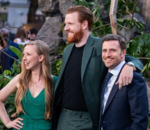 From left to right, photo shows Anna Lapwood, Paul Gorton, Alexander Dragonetti attend the Jurassic World Rebirth" World Premiere at the Odeon Luxe Leicester Square.