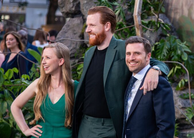 From left to right, photo shows Anna Lapwood, Paul Gorton, Alexander Dragonetti attend the Jurassic World Rebirth" World Premiere at the Odeon Luxe Leicester Square.