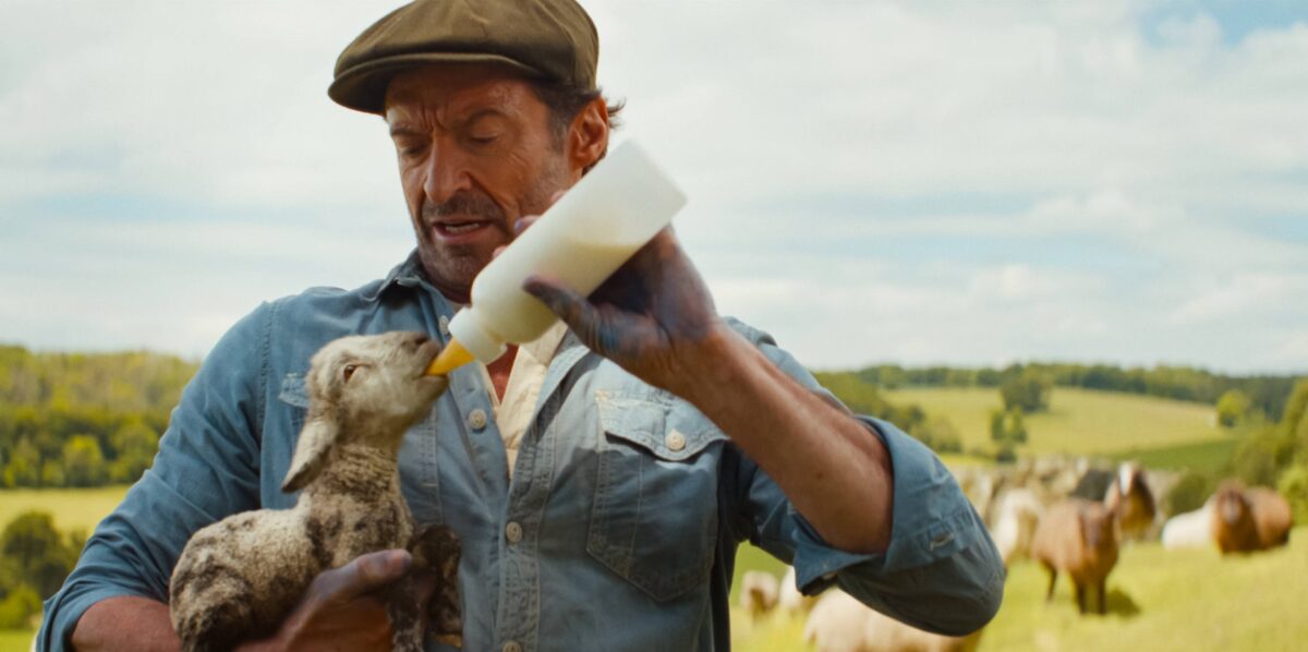 Photo shows (L to R) Tommy Birchall as the voice of The Winter Lamb and Hugh Jackman as George Hardy in 'The Sheep Detectives.' Hugh Jackman’s new family film, 'The Sheep Detectives,' has a clear animal rights message.