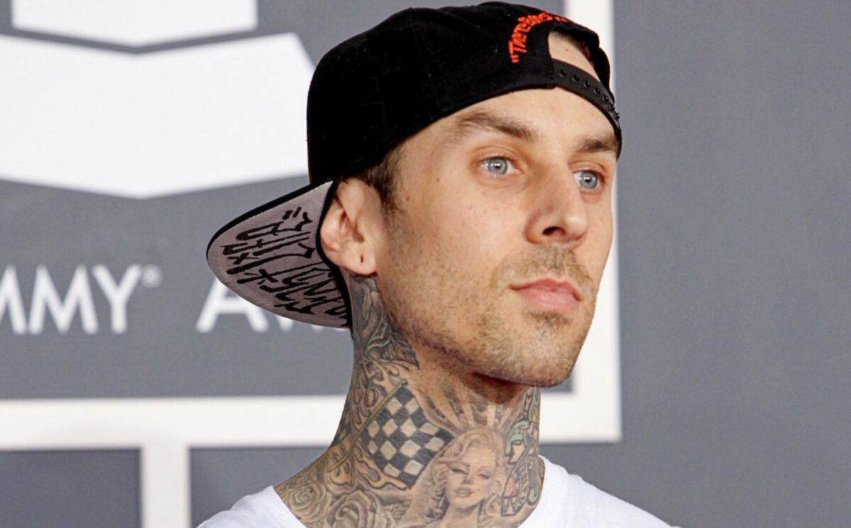 Photo shows Travis Barker at an event. Vegan fast-food brand Mr Charlie’s is opening a new store this weekend and Travis Barker is expected to make a “special appearance.”