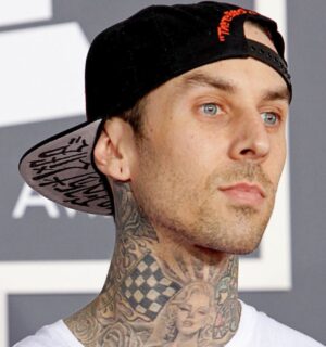 Photo shows Travis Barker at an event. Vegan fast-food brand Mr Charlie’s is opening a new store this weekend and Travis Barker is expected to make a “special appearance.”