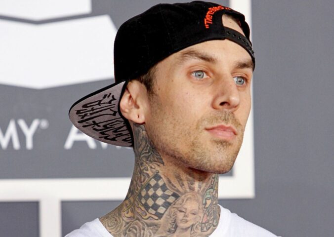 Photo shows Travis Barker at an event. Vegan fast-food brand Mr Charlie’s is opening a new store this weekend and Travis Barker is expected to make a “special appearance.”