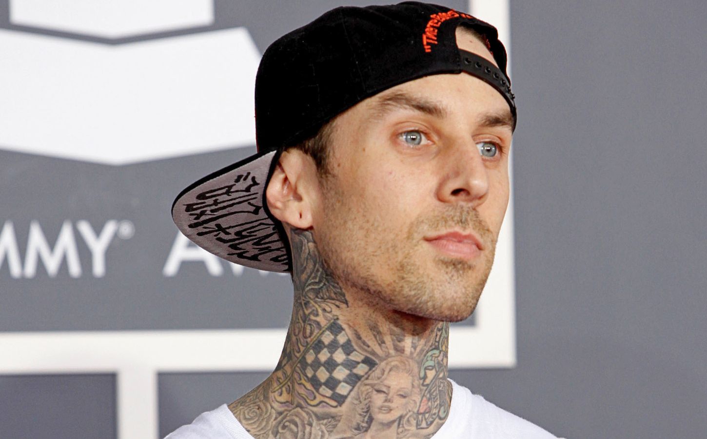Photo shows Travis Barker at an event. Vegan fast-food brand Mr Charlie’s is opening a new store this weekend and Travis Barker is expected to make a “special appearance.”