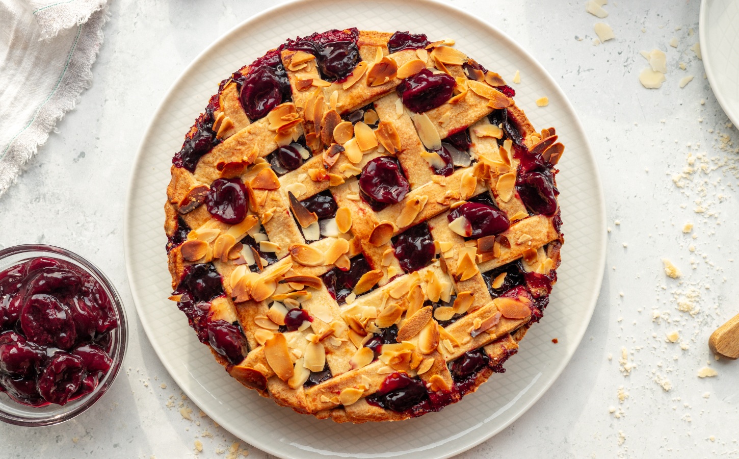 Vegan Almond Cherry Pie with almond flour and lattice top