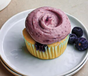 Zesty Blueberry Cupcakes with juicy blueberries, tangy cream cheese frosting, and citrus