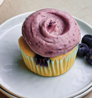 Zesty Blueberry Cupcakes with juicy blueberries, tangy cream cheese frosting, and citrus