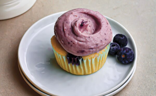 Zesty Blueberry Cupcakes with juicy blueberries, tangy cream cheese frosting, and citrus