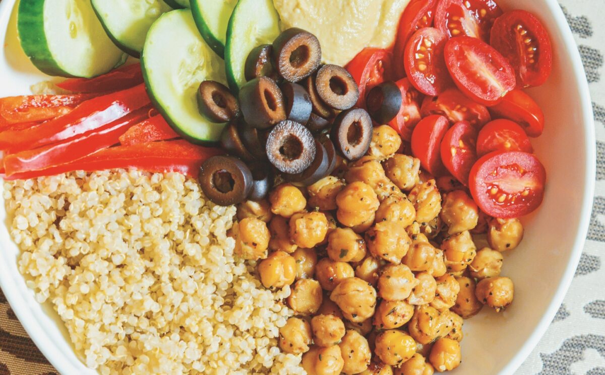 Mediterranean Power Bowls with quinoa, cucumber, olives, hummus, and bell pepper