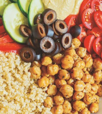 Mediterranean Power Bowls with quinoa, cucumber, olives, hummus, and bell pepper