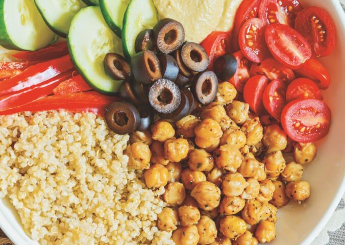 Mediterranean Power Bowls with quinoa, cucumber, olives, hummus, and bell pepper