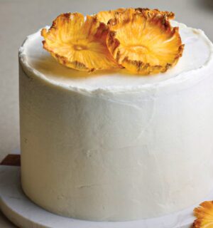 Coconut & Pineapple Layer Cake with pineapple slices, cinnamon, coconut milk, and vanilla for vegan birthday cake ideas