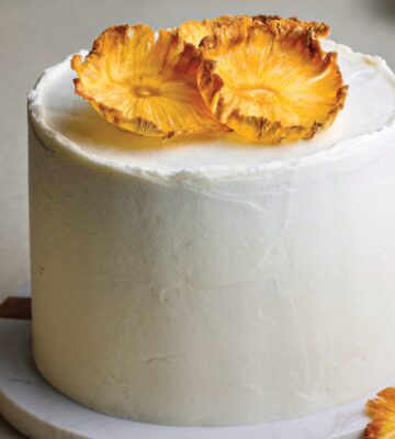Coconut & Pineapple Layer Cake with pineapple slices, cinnamon, coconut milk, and vanilla for vegan birthday cake ideas