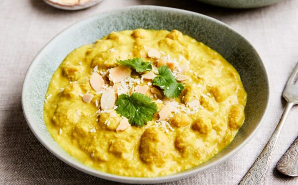 chickpeas and cannellini beans cooked in a coconut milk, carrot, and almond sauce for vegan coconut recipes