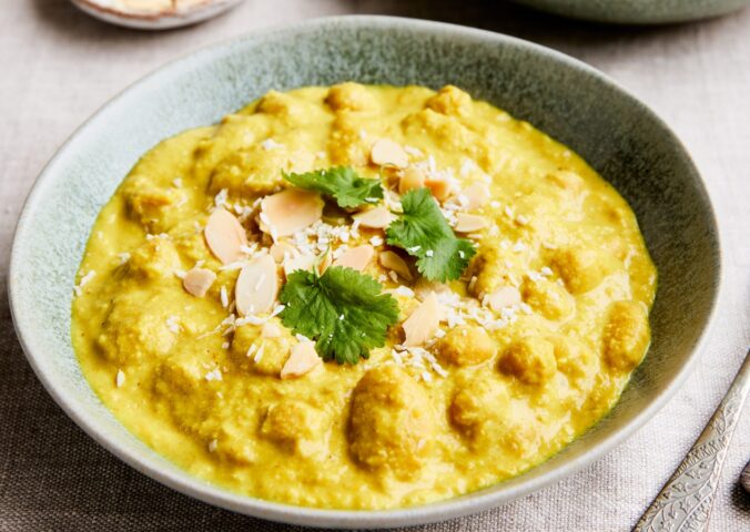 chickpeas and cannellini beans cooked in a coconut milk, carrot, and almond sauce for vegan coconut recipes